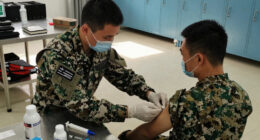 US military requires flu vaccine for some after outbreak in Texas training center
